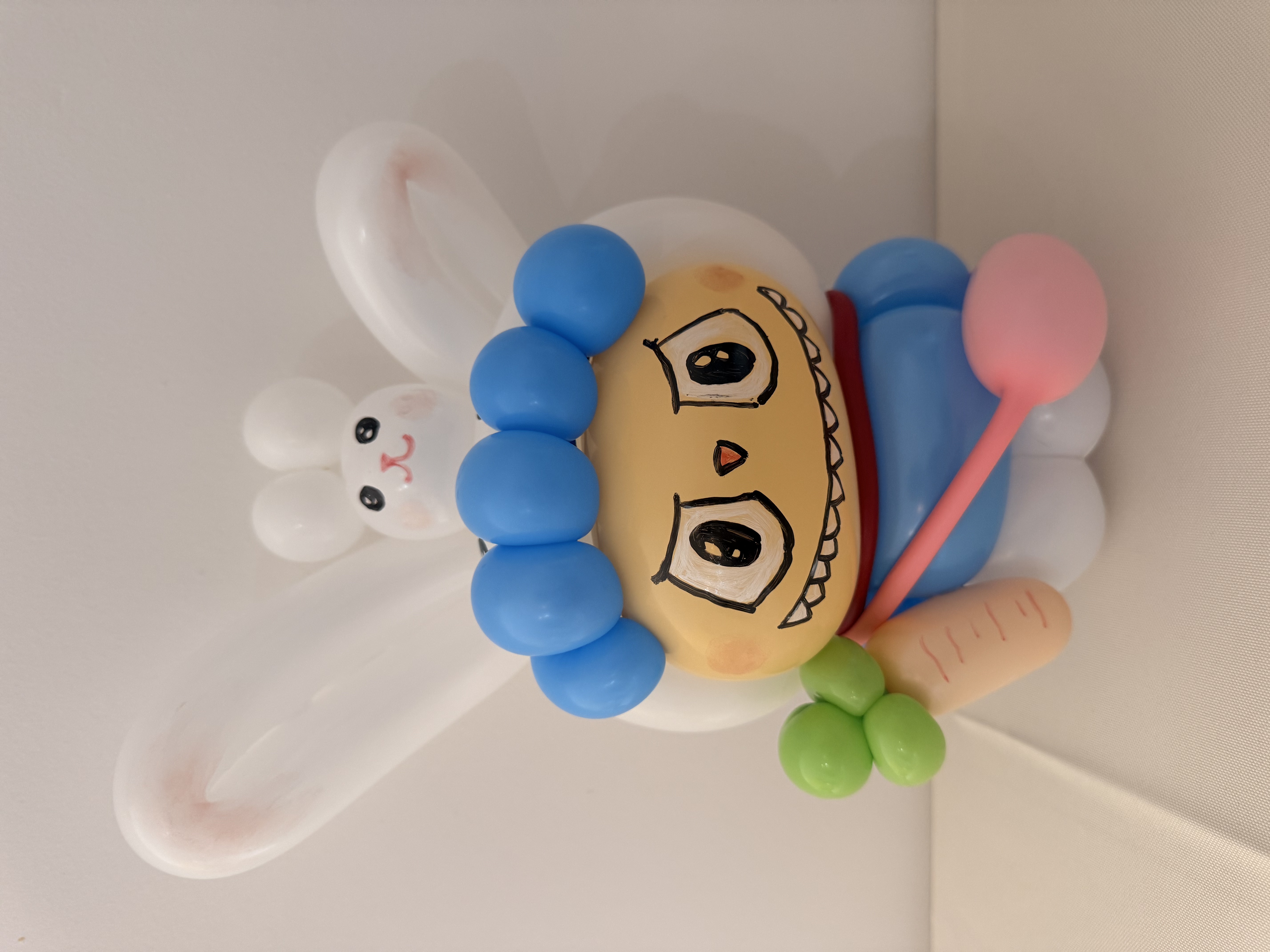 Blue Labubu balloon with white bunny companion